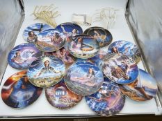 Sixteen Franklin Mint Royal Doulton wall plates depicting Maidens of The Moon, Fire, Rainbow,