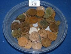 A large quantity of coins, mainly British pennies.