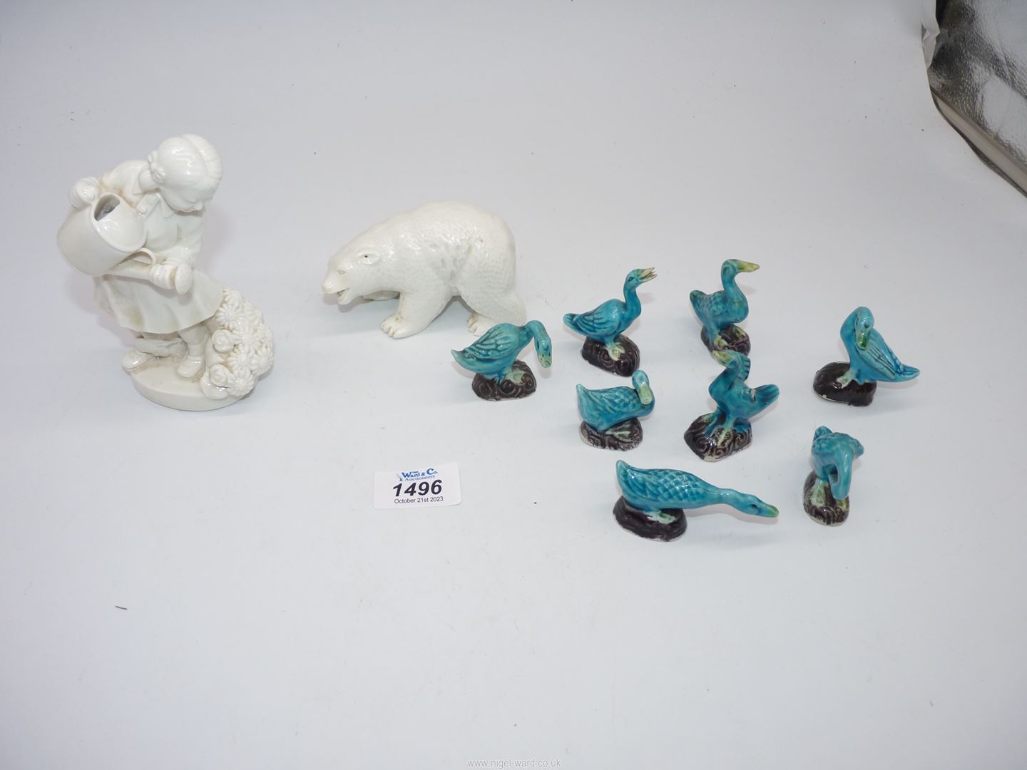 A Blanc de chine figure of Girl watering flowers and Polar bear, plus Chinese turquoise ducks,