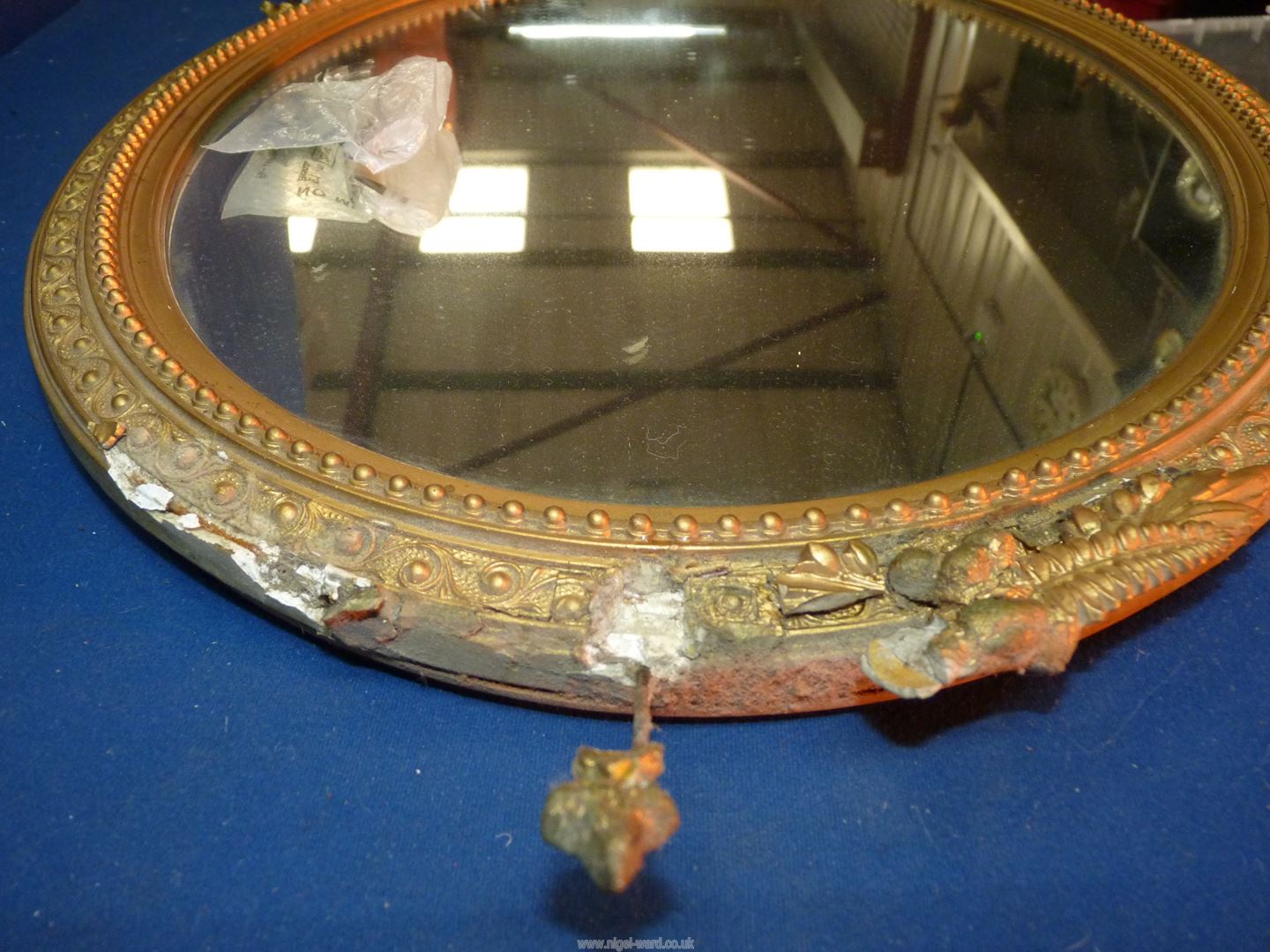 A gilt framed oval wall Mirror, (frame a/f), 23" x 16 1/2". - Image 4 of 4