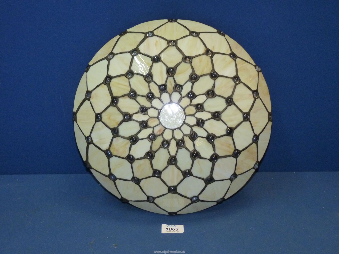 A Tiffany style cream opaque ceiling Light shade, 14" diameter.