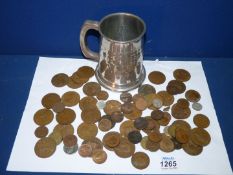 A quantity of pre-decimal coins including silver threepences, threepenny bits, pennies, farthings,