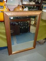 A large rectangular Mirror, 42" wide x 30" high.