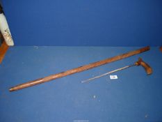 A Sword Stick in wooden case with spiral carved detail (some splitting).