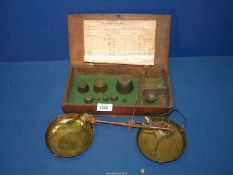 A 'T. Bourne, Birmingham' Victorian Oak cased balance scales and weights.