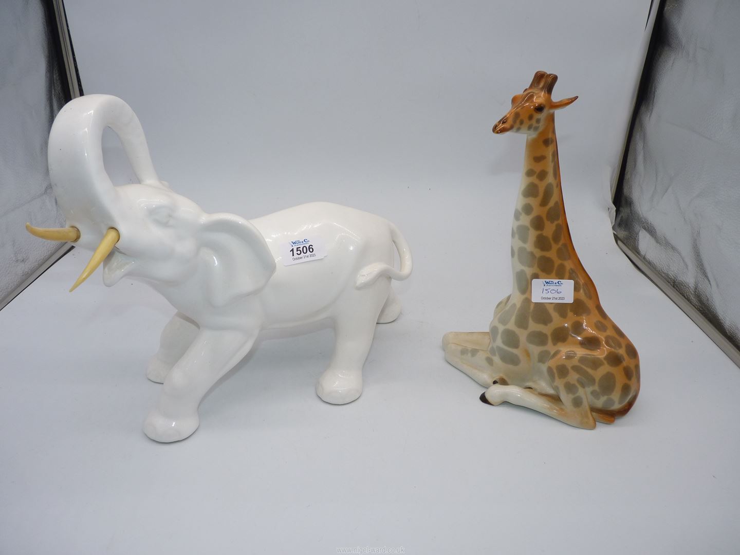 A large USSR giraffe (small chip to ear) and a continental white elephant.