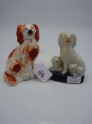 A small Staffordshire red and white mantle spaniel 6 1/4" and a Staffordshire pottery "Poodle"