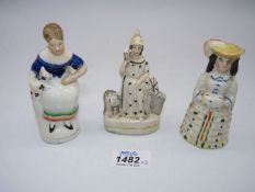 Three miniature Staffordshire style figurines including Britannia Lady with cat on her lap,