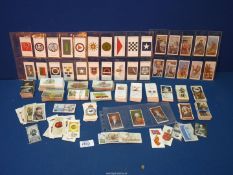 A quantity of various military and history cigarette cards by Wills, Players, etc.