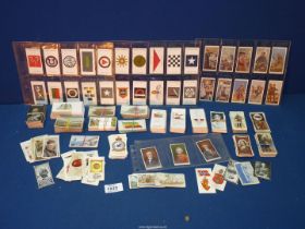 A quantity of various military and history cigarette cards by Wills, Players, etc.