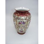 A pearlescent and floral oriental vase, 12" high.