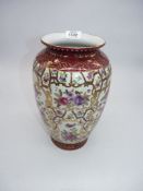 A pearlescent and floral oriental vase, 12" high.