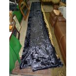 A pair of navy blue crushed velvet curtains having gold coloured linings 210" x 54".