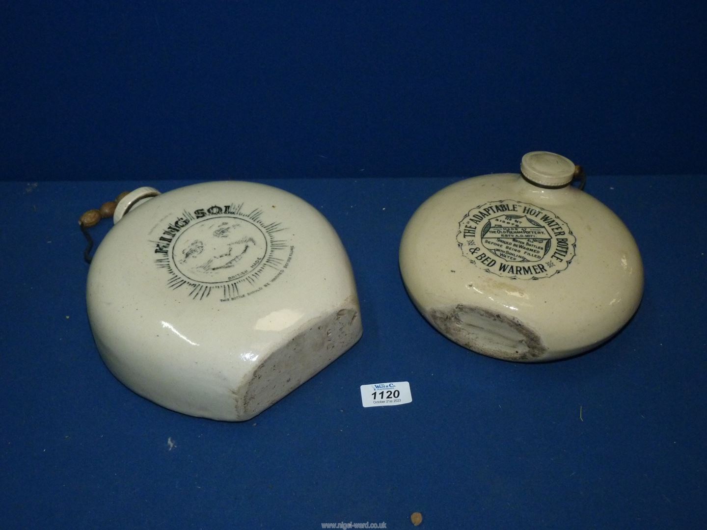 Two stoneware hot water bottles, one by Old Fulham pottery,