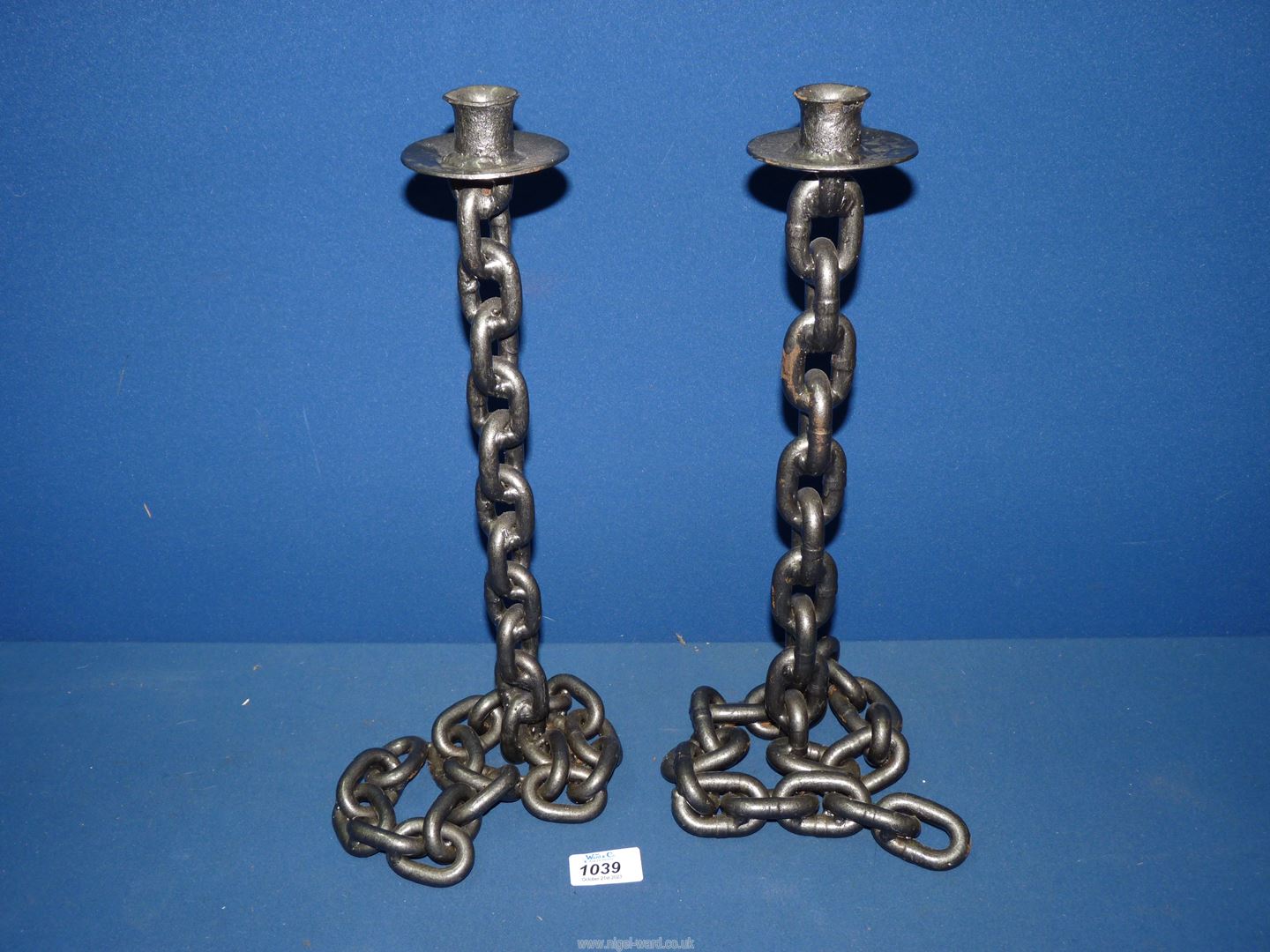 Two chain effect candlesticks, 15 3/4".