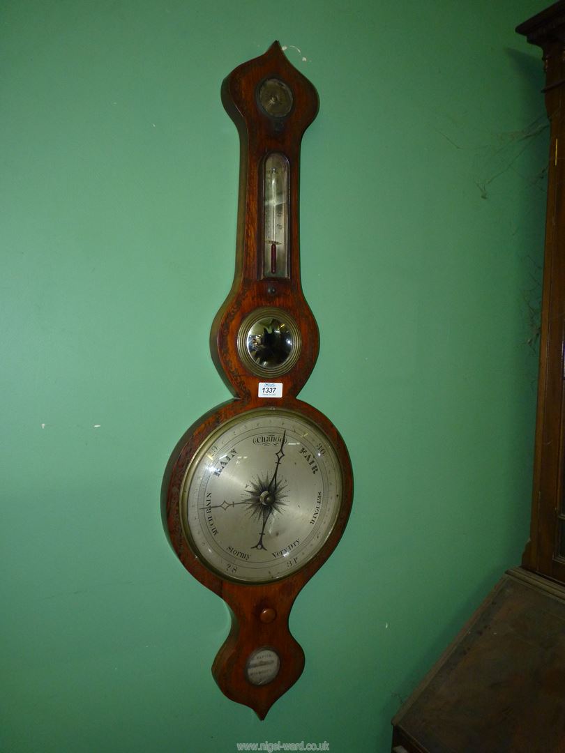 A Mahogany five-point mercury barometer with barometer, convex mirror, thermometer,