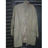 A lady's Spanish lambskin leather three-quarter length Coat in cream with funnel neck,