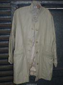 A lady's Spanish lambskin leather three-quarter length Coat in cream with funnel neck,