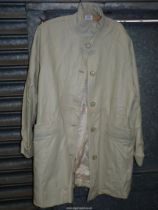 A lady's Spanish lambskin leather three-quarter length Coat in cream with funnel neck,