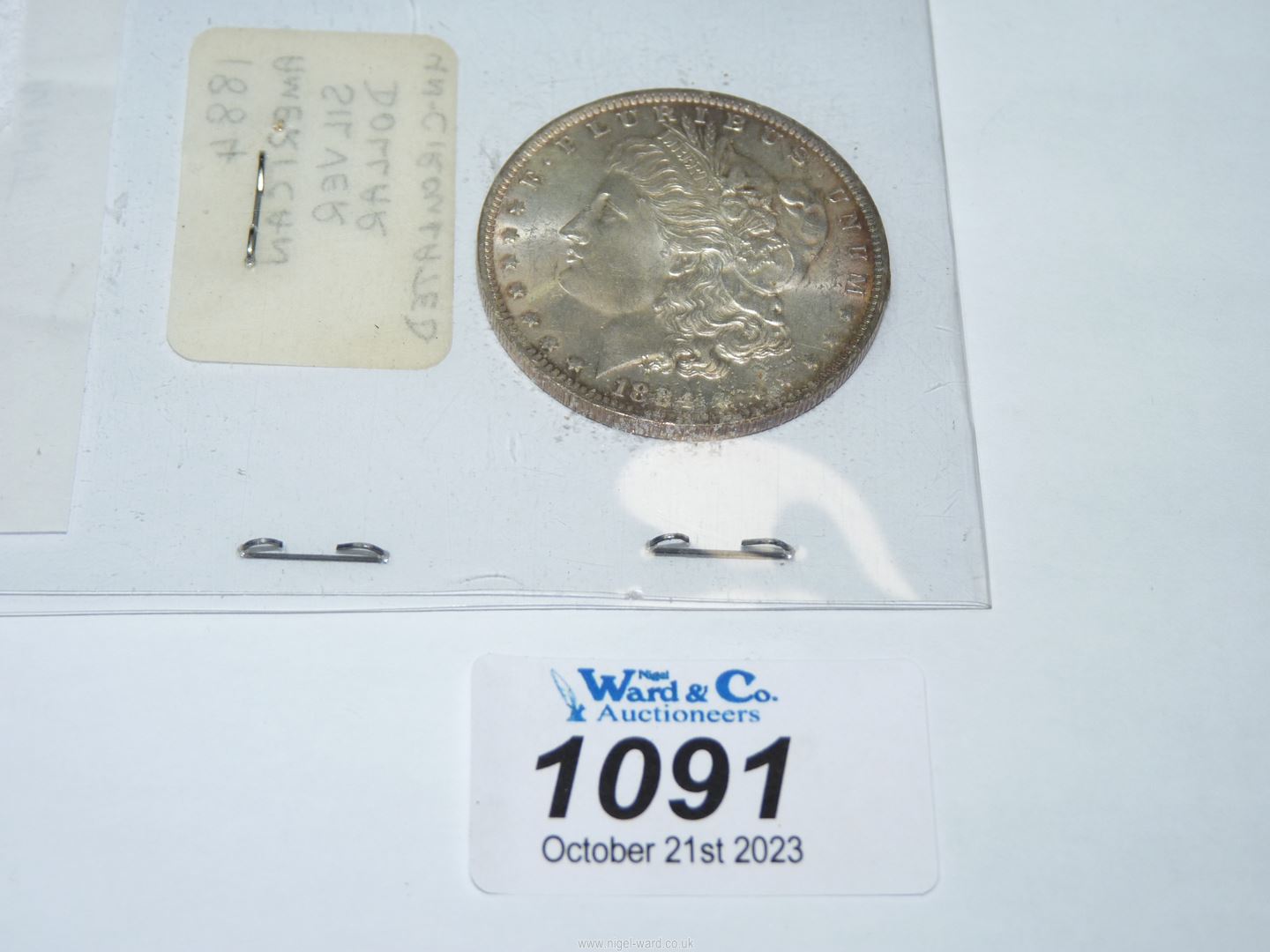 An American silver dollar dated 1884 from The New Orleans Mint. - Image 2 of 2