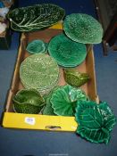 A quantity of leaf/cabbage ware including Hope and Carter Burslem, maple leaf plates,