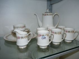 A Paragon 'Belinda' coffee set to include; coffee pot, sugar bowl, milk jug,