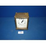 A brass cased Smiths eight day Carriage clock with inscription to the top,