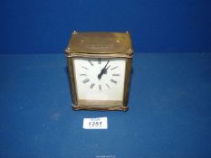 A brass cased Smiths eight day Carriage clock with inscription to the top,