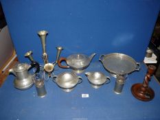 A W.F. Johnson hand beaten three piece Pewter Teaset and a pair of Epns Vases with glass liners.