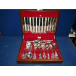 A good quantity of Kings Pattern cutlery in wooden canteen including carving set, berry spoons,