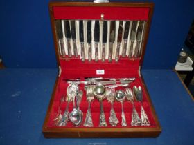 A good quantity of Kings Pattern cutlery in wooden canteen including carving set, berry spoons,