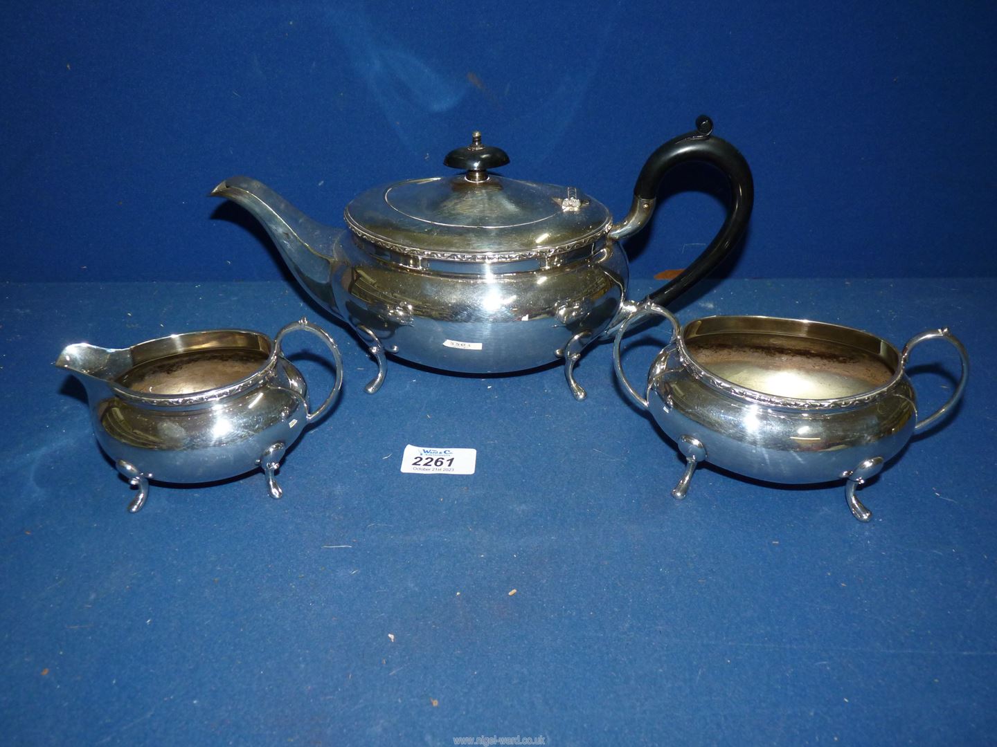 An Epns Teaset including teapot with Bakelite finial and handle, milk jug and sugar bowl.