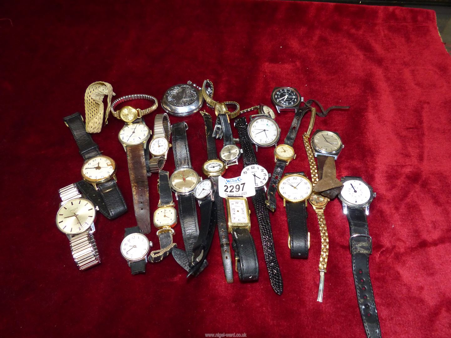 A Longines gents watch together with a large quantity of gents and ladies watches.