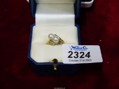 A 9ct gold two pearl and chip diamond ring, Birmingham.