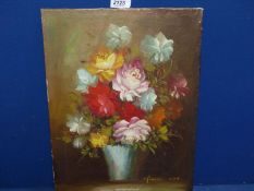 An unframed Oil on canvas of still life of flowers by Robert Cox, 1' x 1' 4".