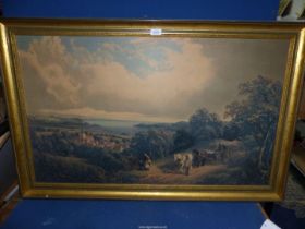 A large framed print on board of travellers on a country lane with a coastal town in the valley and