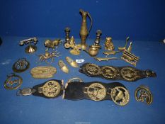 An old "Black Magic" tin of brass ornaments, martingales, etc.