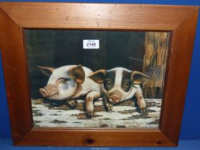 A framed Print, two Piglets by Ian Nathan, 18 1/2" x 15 1/4".