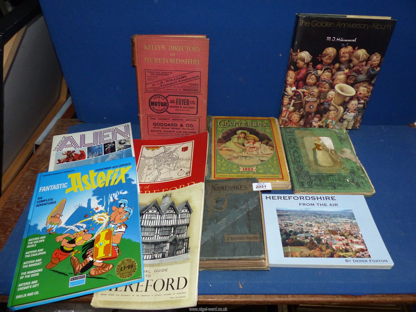 A box of books to include Herefordshire from the Air, Chatter box 1902,