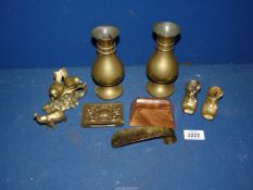 A small quantity of brass including pair of vases, boots, shoe horn, etc.