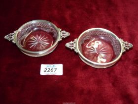 A pair of cut glass Quaich's having Birmingham 1901 silver rim and handles, makers mark 'H.