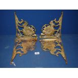 A set of four heavy ornate Brass wall brackets decorated with sunflowers and berries,