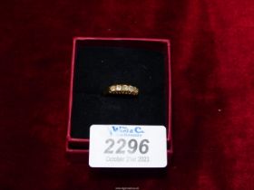 An 18ct gold Engagement ring set with five diamonds, London. Size M.