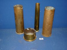 Four brass gun shells; one inscribed 'From John Walford May 1916', etc.
