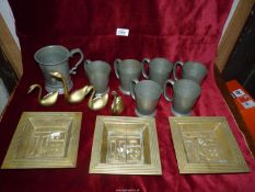 Six beaten Pewter Tankards and another 1 pint tankard and two pairs of brass swans and three brass