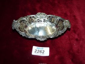 A Silver pierced and floral embossed bonbon Dish, Birmingham maker H.M. 1903, 34.5g.