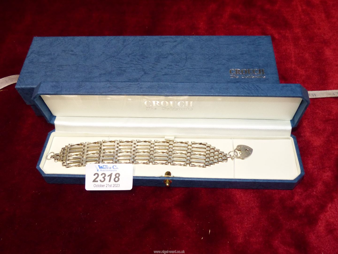 A Silver seven bar-gate Bracelet with silver locket, 7" long, maker H&M, in Crouch Jewellers box. - Image 2 of 2