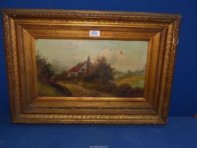 A gilt framed Oil on board of a cottage in countryside, unsigned, 2' 2" x 1' 6".