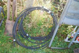 Two rolls of armoured cable.