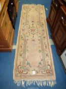 A pink and cream runner 83" x 27 1/2"